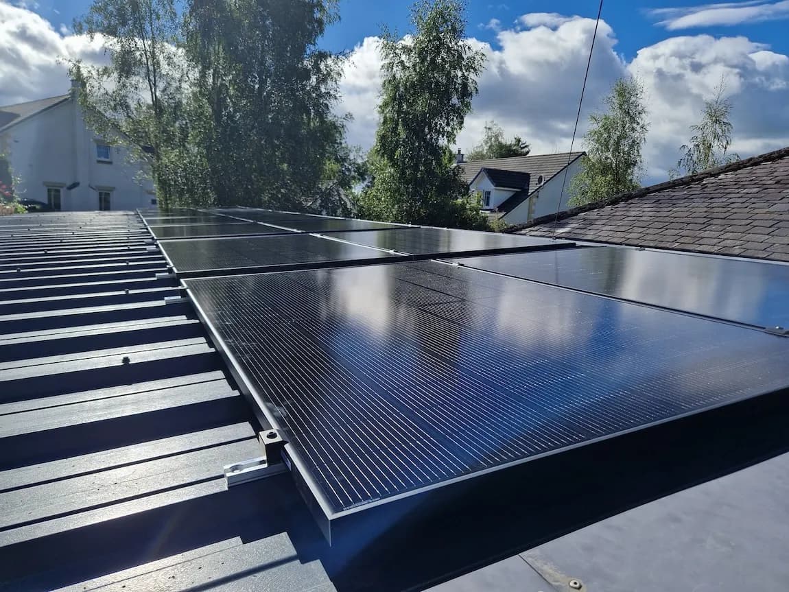 Solar panel installation on a garden building in Dunblane