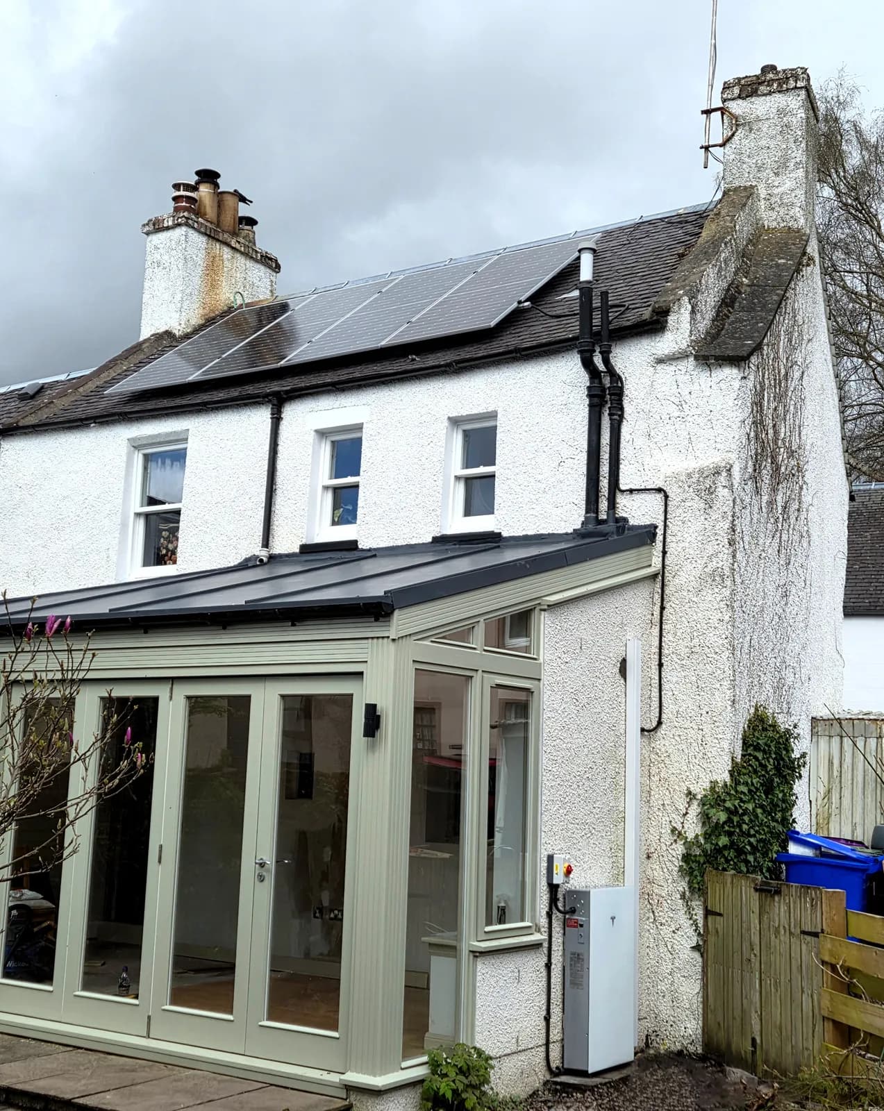 Close view of the solar array on the natural slate roof of a Dunblane property