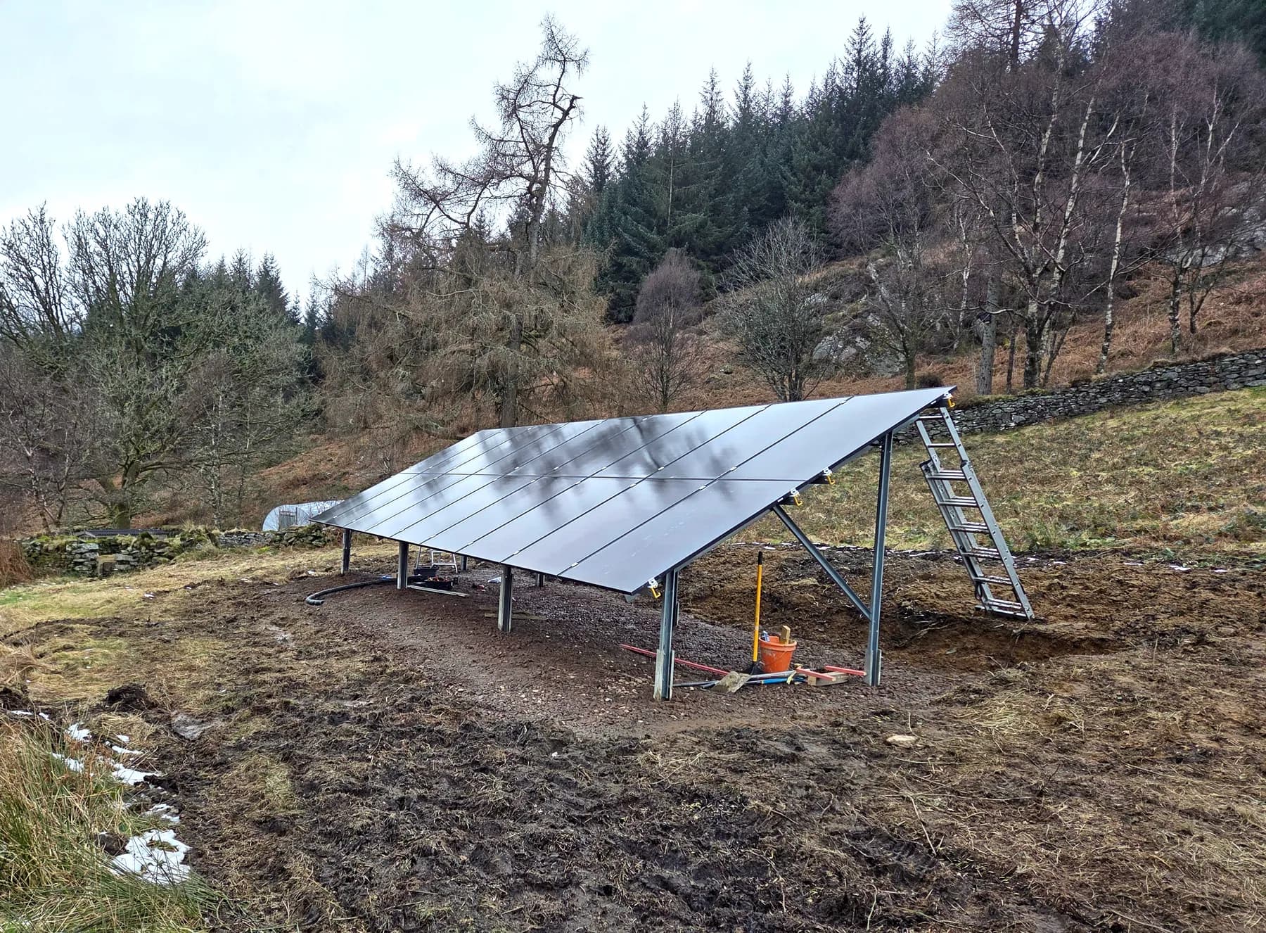 Ground-mounted solar array installed by Mackie Electrical in Kinlochard, The Trossachs